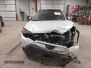 2023 Toyota Corolla Cross Hybrid S with VIN 7MUFBABG0PV004809, listed as a IAAI auction lot 41489550 with 59,172 mi miles and . Bid and sale history available at DreamBid. Image 12.