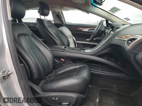 2016 Lincoln MKZ z VIN 3LN6L2GK3GR623560, wystawiony jako Copart lot #55337905 z przebiegiem 167 403 mil mil oraz Szkoda całkowita • Salvage title. Historia ofert i sprzedaży dostępna na DreamBid. Obrazek 7.