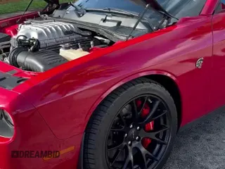 2016 Dodge Challenger SRT Hellcat z VIN 2C3CDZC98GH249222, wystawiony jako Copart lot #70536795 z przebiegiem 52 968 mil mil oraz Szkoda całkowita • Salvage title. Historia ofert i sprzedaży dostępna na DreamBid. Obrazek 11.
