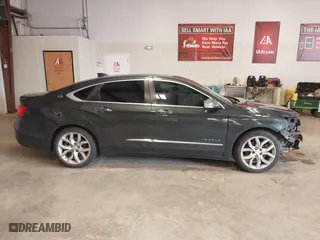 2015 Chevrolet Impala LTZ with VIN 2G1165S33F9136329, listed as a IAAI auction lot 41639698 with 198,027 mi miles. Bid and sale history available at carsss.com. Image 13.