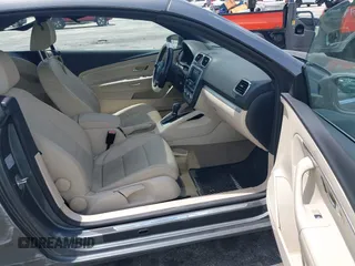 2014 Volkswagen Eos Sport with VIN WVWBW8AH2EV000313, listed as a IAAI auction lot 42333112 with 106,125 mi miles and . Bid and sale history available at DreamBid. Image 5.