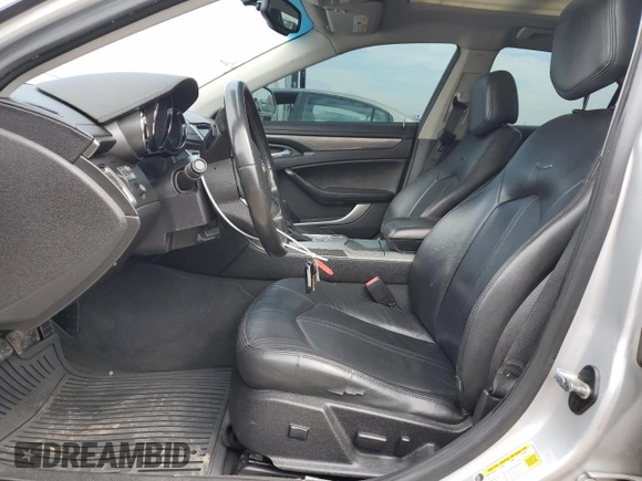 2011 Cadillac CTS Performance with VIN 1G6DL5ED2B0164311, listed as a Copart auction lot 61906165 with 134,244 mi miles and Salvage title. Bid and sale history available at DreamBid. Image 7.