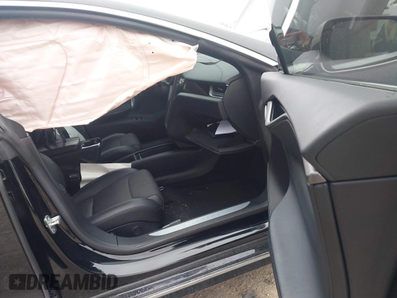 2018 Tesla Model S 75D with VIN 5YJSA1E22JF282828, listed as a IAAI auction lot 41595543 with 72,571 mi miles and . Bid and sale history available at DreamBid. Image 5.