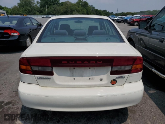 2004 Subaru Legacy Sedan (Natl) L with VIN 4S3BE625247210733, listed as a Copart auction lot 74218154 with 175,254 mi miles and Salvage Title. Bid and sale history available at carsss.com. Image 6.
