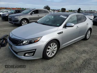 2015 Kia Optima EX with VIN 5XXGN4A75FG505073, listed as a Copart auction lot 50218595 with 77,199 mi miles and Salvage Title. Bid and sale history available at carsss.com. Image 1.