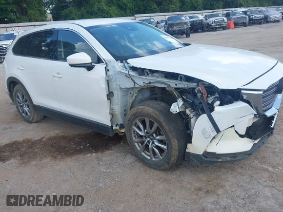 2018 Mazda CX-9 Touring with VIN JM3TCACY7J0222569, listed as a IAAI auction lot 42670932 with 130,644 mi miles and . Bid and sale history available at DreamBid. Image 1.