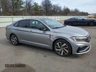 2021 Volkswagen Jetta GLI S z VIN 3VW6T7BU5MM095245, wystawiony jako Copart lot #53602815 z przebiegiem 36 296 mil mil oraz Szkody całkowita. Historia ofert i sprzedaży dostępna na DreamBid. Obrazek 4.