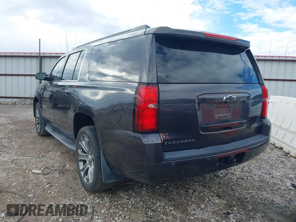 2015 Chevrolet Suburban LT with VIN 1GNSKJKC8FR717435, listed as a IAAI auction lot 41313726 with 120,731 mi miles and . Bid and sale history available at DreamBid. Image 3.