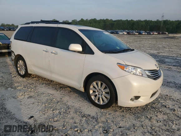 2011 Toyota Sienna XLE with VIN 5TDDK3DC1BS011963, listed as a Copart auction lot 54951565 with 196,868 mi miles and Salvage title. Bid and sale history available at DreamBid. Image 4.