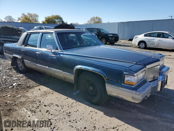 1992 Cadillac Brougham z VIN 1G6DW54E7NR707492, wystawiony jako Copart lot #79950214 z przebiegiem 263 624 mil mil oraz Tytuł czysty. Historia ofert i sprzedaży dostępna na DreamBid. Obrazek 4.