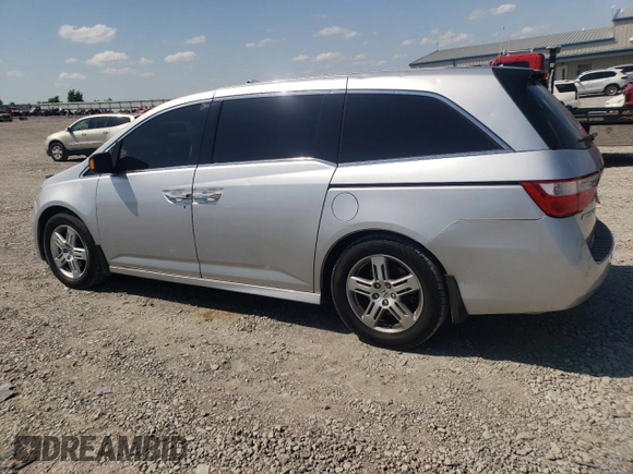 2012 Honda Odyssey Touring with VIN 5FNRL5H94CB009952, listed as a Copart auction lot 54322695 with 135,551 mi miles and Salvage title. Bid and sale history available at DreamBid. Image 2.