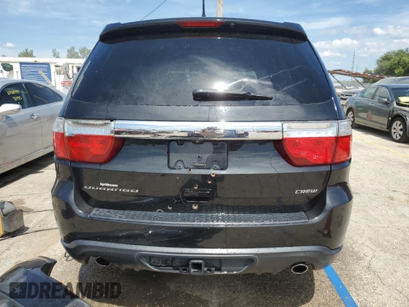 2012 Dodge Durango Crew with VIN 1C4SDHDT2CC229721, listed as a Copart auction lot 68546654 with 118,111 mi miles and Salvage title. Bid and sale history available at DreamBid. Image 6.