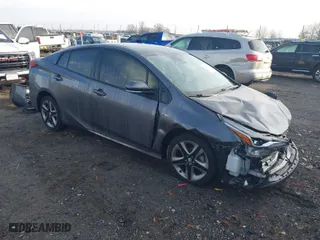 2021 Toyota Prius L Eco with VIN JTDKAMFU1M3149965, listed as a IAAI auction lot 38641916 with 69,942 mi miles. Bid and sale history available at carsss.com. Image 1.