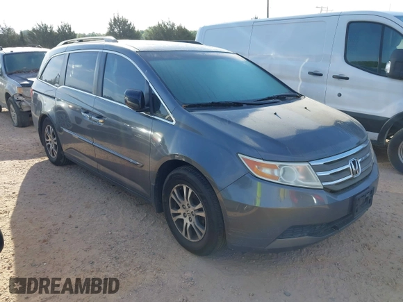 2012 Honda Odyssey EX-L with VIN 5FNRL5H63CB006272, listed as a IAAI auction lot 42074163 with 187,785 mi miles and . Bid and sale history available at carsss.com. Image 1.
