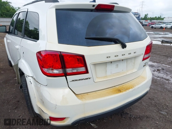 2017 Dodge Journey SXT z VIN 3C4PDCBG4HT531635, wystawiony jako IAAI lot #42460200 z przebiegiem 152 293 mil mil oraz . Historia ofert i sprzedaży dostępna na DreamBid. Obrazek 6.