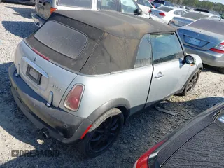 2006 MINI Convertible with VIN WMWRF33586TF64534, listed as a IAAI auction lot 41484453 with 180,748 mi miles and . Bid and sale history available at DreamBid. Image 4.
