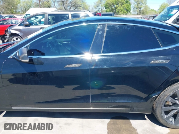 2018 Tesla Model S 75D with VIN 5YJSA1E22JF289195, listed as a IAAI auction lot 41825949 with 49,217 mi miles and . Bid and sale history available at DreamBid. Image 14.