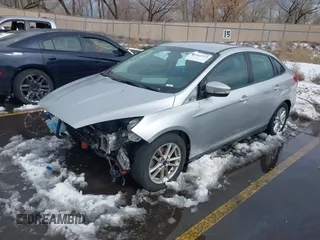 2016 Ford Focus SE with VIN 1FADP3F21GL325603, listed as a IAAI auction lot 41562523 with 97,749 mi miles. Bid and sale history available at carsss.com. Image 2.