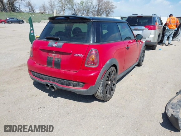 2010 MINI Hardtop S with VIN WMWMF7C51ATX43277, listed as a IAAI auction lot 42107871 with 102,886 mi miles and . Bid and sale history available at DreamBid. Image 4.