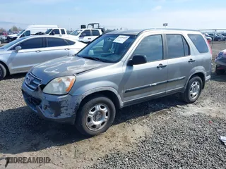2006 Honda CR-V LX with VIN JHLRD68516C006561, listed as a IAAI auction lot 41855457 with 215,139 mi miles. Bid and sale history available at carsss.com. Image 17.