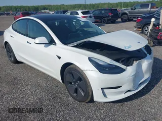 2023 Tesla Model 3 with VIN 5YJ3E1EA1PF621698, listed as a IAAI auction lot 42167852 with 23,778 mi miles and . Bid and sale history available at DreamBid. Image 1.
