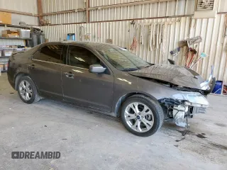 2012 Ford Fusion SE z VIN 3FAHP0HA1CR320160, wystawiony jako Copart lot #57597615 z przebiegiem 142 938 mil mil oraz Szkoda całkowita • Salvage title. Historia ofert i sprzedaży dostępna na DreamBid. Obrazek 4.