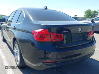 2018 BMW 3 Series 330i xDrive with VIN WBA8D9G5XJNU67750, listed as a IAAI auction lot 42291752 with 146,716 mi miles and . Bid and sale history available at DreamBid. Image 3.