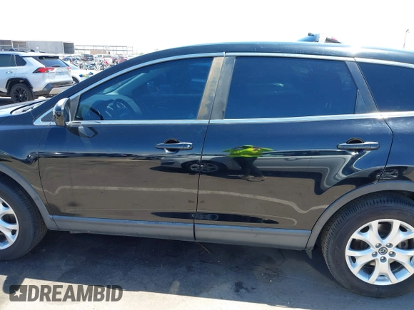 2013 Mazda CX-9 Touring with VIN JM3TB2CV0D0411681, listed as a IAAI auction lot 42131639 with 116,638 mi miles and . Bid and sale history available at carsss.com. Image 14.