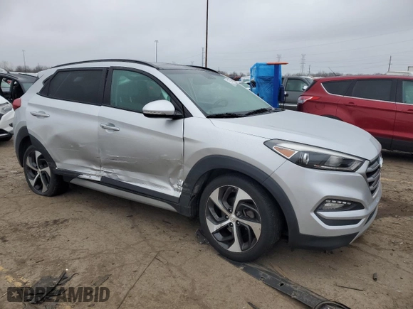 2018 Hyundai Tucson Value with VIN KM8J33A28JU748241, listed as a Copart auction lot 87492464 with 56,457 mi miles and Salvage Title. Bid and sale history available at carsss.com. Image 4.