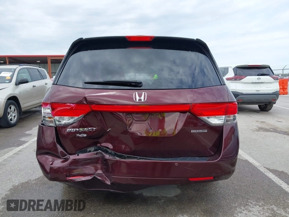 2014 Honda Odyssey Touring with VIN 5FNRL5H9XEB073156, listed as a IAAI auction lot 41990714 with 166,129 mi miles and . Bid and sale history available at DreamBid. Image 16.