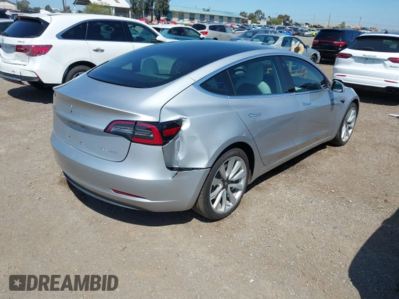 2018 Tesla Model 3 Long Range Battery with VIN 5YJ3E1EB5JF100578, listed as a IAAI auction lot 41959766 with 57,931 mi miles and . Bid and sale history available at DreamBid. Image 4.