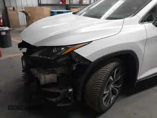 2018 Lexus RX 350L Premium z VIN JTJGZKCA3J2003885, wystawiony jako IAAI lot #42381977 z przebiegiem 76 823 mil mil oraz . Historia ofert i sprzedaży dostępna na DreamBid. Obrazek 6.