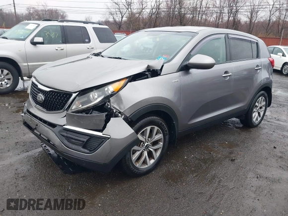2014 Kia Sportage LX with VIN KNDPBCAC0E7601636, listed as a IAAI auction lot 41832978 with 145,353 mi miles and . Bid and sale history available at carsss.com. Image 2.