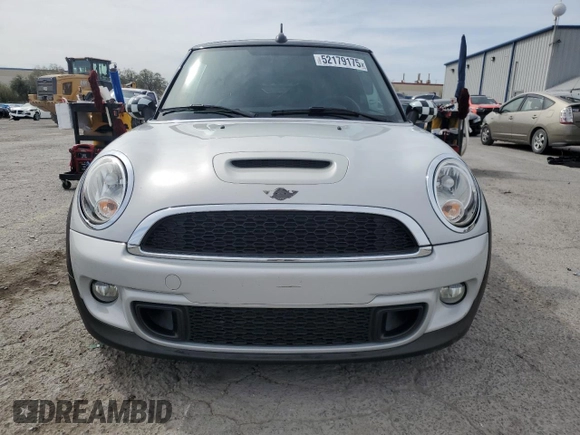 2014 MINI Convertible S with VIN WMWZP3C53ET707205, listed as a Copart auction lot 52179175 with 101,209 mi miles and Salvage Title. Bid and sale history available at DreamBid. Image 5.
