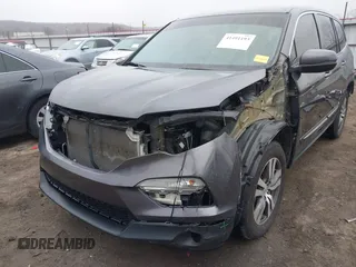 2017 Honda Pilot EX-L with VIN 5FNYF6H55HB063063, listed as a IAAI auction lot 41491193 with 75,444 mi miles and . Bid and sale history available at DreamBid. Image 6.