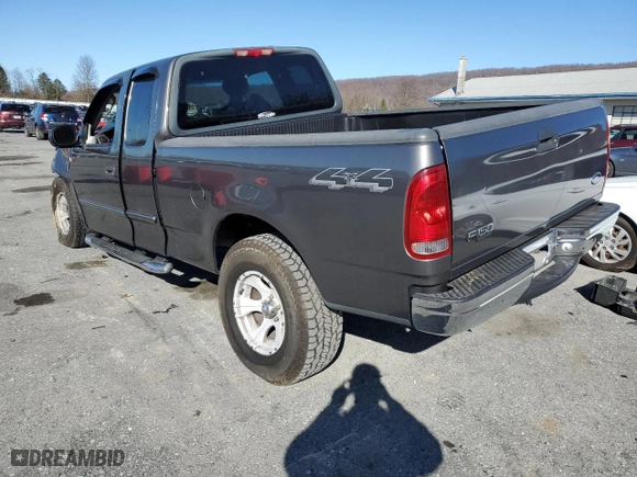 2004 Ford F-150 Heritage XL with VIN 2FTRX18W74CA39541, listed as a Copart auction lot 50390125 with 0 mi miles and Salvage Title. Bid and sale history available at carsss.com. Image 2.