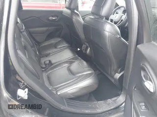 2014 Jeep Cherokee Limited with VIN 1C4PJLDS7EW283526, listed as a IAAI auction lot 41718517 with 129,868 mi miles. Bid and sale history available at carsss.com. Image 8.