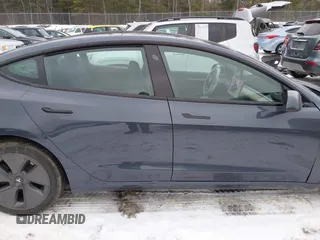 2023 Tesla Model 3 Long Range with VIN 5YJ3E1EBXPF708122, listed as a IAAI auction lot 41185314 with 27,765 mi miles and . Bid and sale history available at DreamBid. Image 13.