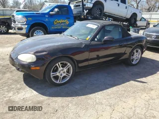 2004 Mazda MX-5 Miata LS z VIN JM1NB353340401035, wystawiony jako Copart lot #49822965 z przebiegiem 96 085 mil mil oraz Szkoda całkowita • Salvage title. Historia ofert i sprzedaży dostępna na DreamBid. Obrazek 1.
