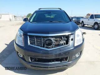 2013 Cadillac SRX Performance Collection with VIN 3GYFNHE35DS548632, listed as a IAAI auction lot 41990670 with 98,659 mi miles. Bid and sale history available at carsss.com. Image 12.