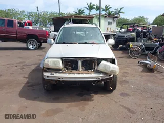2002 Suzuki Grand Vitara with VIN JS3TE62VX24154173, listed as a IAAI auction lot 41711181 with 224,024 mi miles. Bid and sale history available at carsss.com. Image 13.