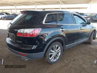 2011 Mazda CX-9 Grand Touring with VIN JM3TB2DV7B0306387, listed as a IAAI auction lot 42428565 with 167,658 mi miles and . Bid and sale history available at DreamBid. Image 4.