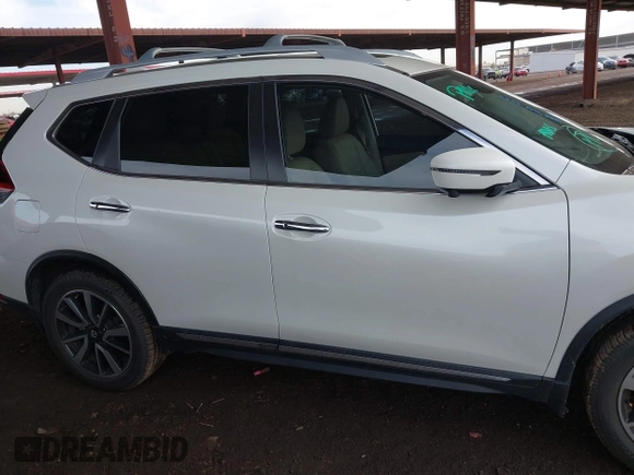 2019 Nissan Rogue SV with VIN 5N1AT2MT0KC791106, listed as a IAAI auction lot 41890002 with 55,430 mi miles and . Bid and sale history available at DreamBid. Image 14.