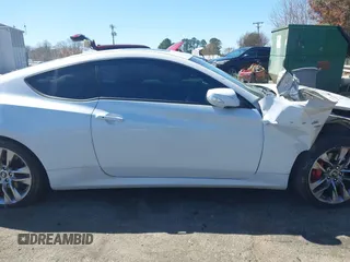 2016 Hyundai Genesis Coupe R-Spec with VIN KMHHU6KJ7GU132025, listed as a IAAI auction lot 41848778 with 63,562 mi miles and . Bid and sale history available at DreamBid. Image 13.