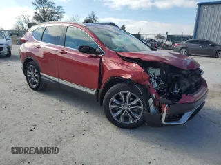 2020 Honda CR-V Touring with VIN 2HKRW1H97LH402586, listed as a Copart auction lot 83325814 with 61,232 mi miles and Salvage Title. Bid and sale history available at carsss.com. Image 4.