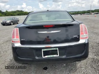 2012 Chrysler 300 C with VIN 2C3CCAKTXCH151465, listed as a Copart auction lot 65820264 with 132,609 mi miles and Salvage Title. Bid and sale history available at DreamBid. Image 6.