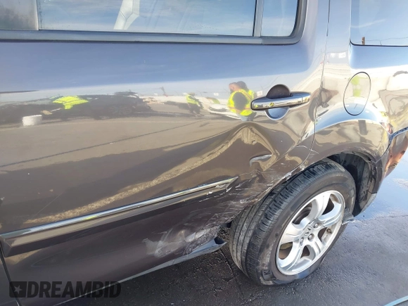 2013 Honda Pilot EX-L with VIN 5FNYF3H57DB031983, listed as a IAAI auction lot 41912221 with 148,908 mi miles. Bid and sale history available at carsss.com. Image 6.