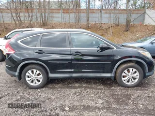 2012 Honda CR-V EX-L with VIN 2HKRM4H72CH607903, listed as a IAAI auction lot 41981042 with 203,584 mi miles. Bid and sale history available at carsss.com. Image 13.