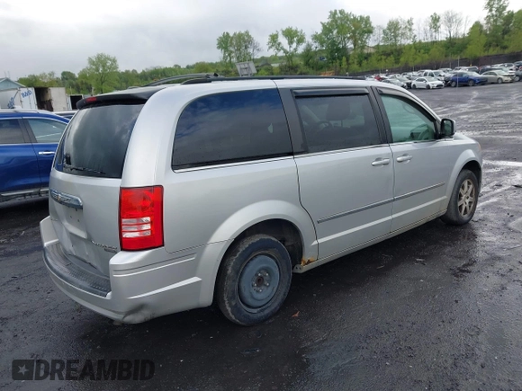 2010 Chrysler Town & Country Touring with VIN 2A4RR5D18AR151604, listed as a IAAI auction lot 42208309 with 207,886 mi miles and . Bid and sale history available at DreamBid. Image 4.