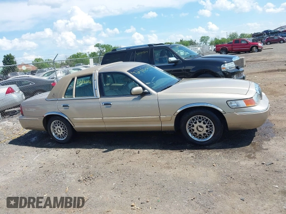 2000 Mercury Grand Marquis GS z VIN 2MEFM74W3YX610461, wystawiony jako IAAI lot #42162767 z przebiegiem 181 400 mil mil oraz . Historia ofert i sprzedaży dostępna na DreamBid. Obrazek 13.